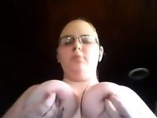 Fat girl with glasses gets naked