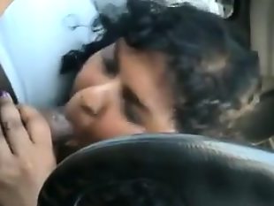 Fat indian sucking on a cock in the car