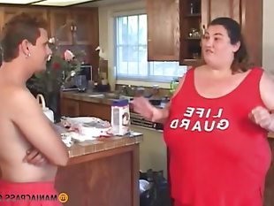 A guy pokes her mouth with his dick