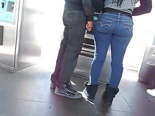 Sexy black chick with a phat ass at the atm