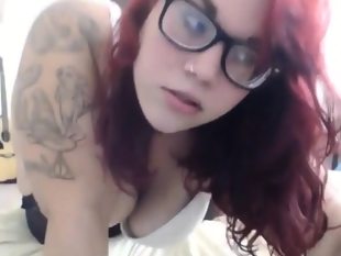 Tattooed bbw with glasses masturbates